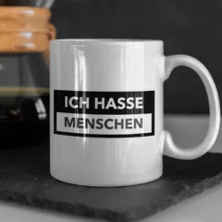 Ich hasse Menschen Tasse rein weiß, bedruckt.