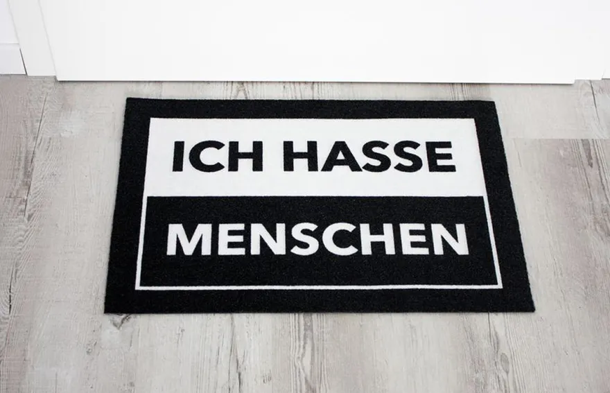 Ich hasse Menschen Tasse und Fußmatten Set